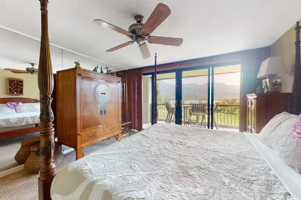 Spacious bedroom offers a restful setting for slow vacation mornings