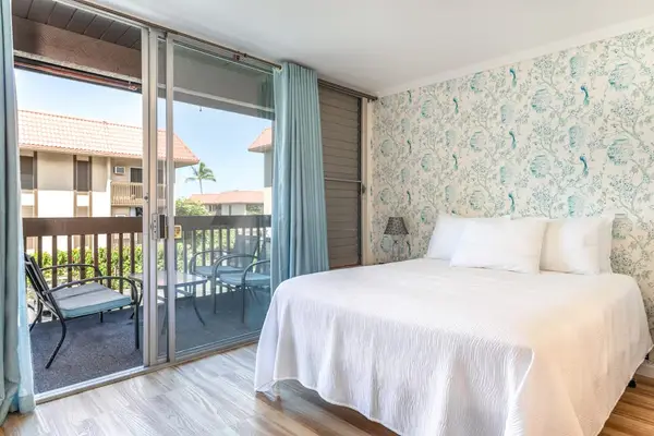 Cozy Bedroom Space with Direct Sliding Door Access to Balcony
