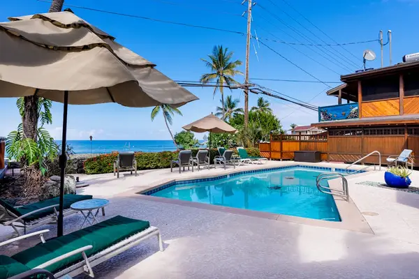 Resort-Style Pool With Lounge Area