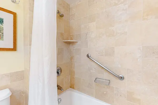 Spacious bathroom with storage for personal essentials