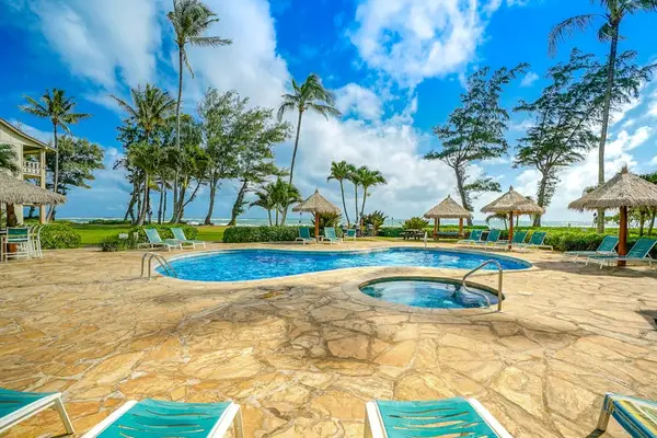 Relax in the oceanfront hot tub with tropical views.