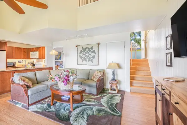 Spacious open-concept living room with ocean views.