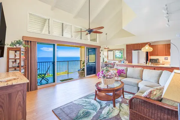 Bright living room with stunning ocean views and natural light.