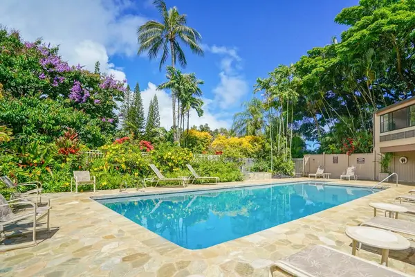 Relax by the resort's sparkling swimming pool.