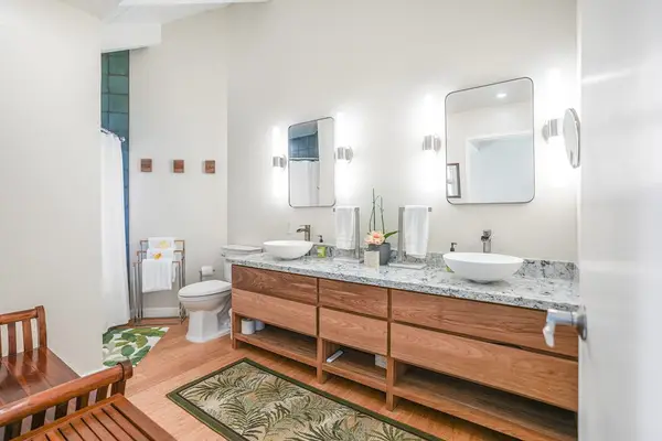 Spacious bathroom with a double vanity and plenty of counter space.