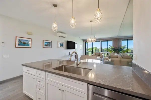 Modern kitchen with generous counter space and convenient seating
