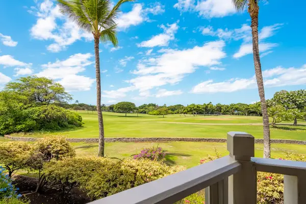 Enjoy tranquil golf course views surrounded by tropical greenery