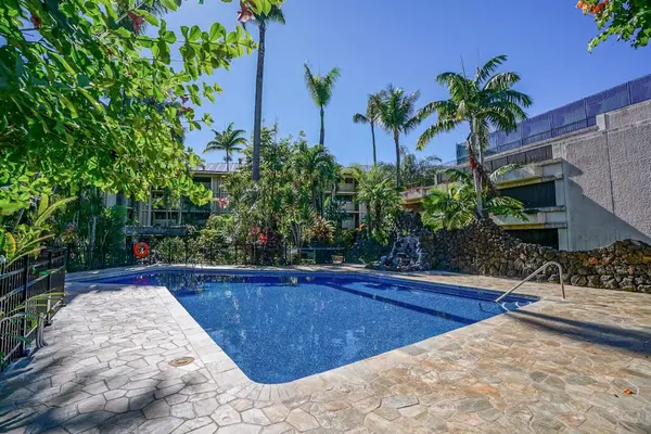 Resort Pool Surrounded By Island Serenity