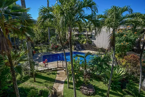 Lush Tropical Gardens With Pool Views