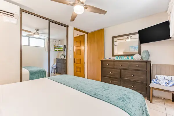 Enjoy a relaxing retreat with thoughtful furnishings and ample storage space.