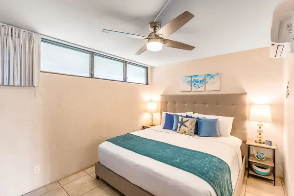 Rest comfortably in the serene primary bedroom with plush king accommodations.