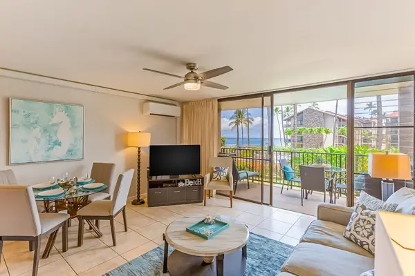 Unwind in the comfortable living area with easy access to the private lanai.