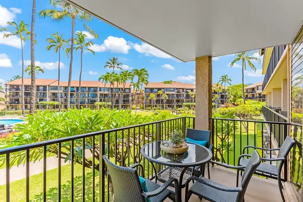 Sip your favorite drink on the private lanai overlooking the tropical grounds.