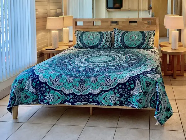 Cozy bedroom with colorful tropical bedding