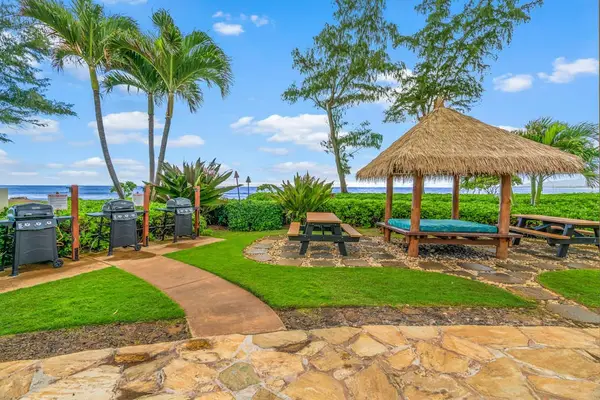 Enjoy Shaded Relaxation By The Grilling Station