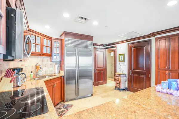Spacious Kitchen With Sleek Stainless Finishes