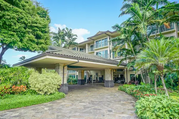Grand Resort Arrival Surrounded By Lush Gardens