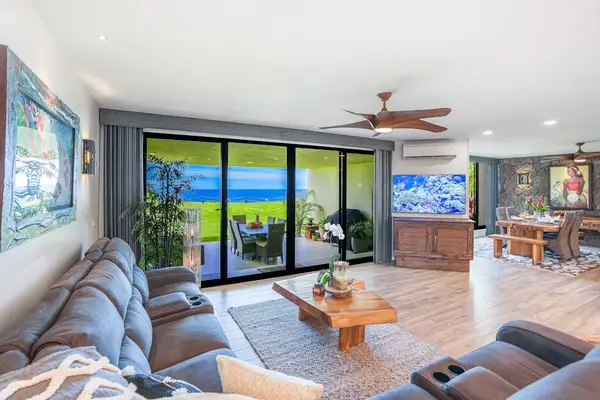Relax in the living room while enjoying panoramic ocean views