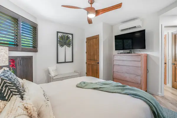 Comfortable guest retreat with a TV and ample storage
