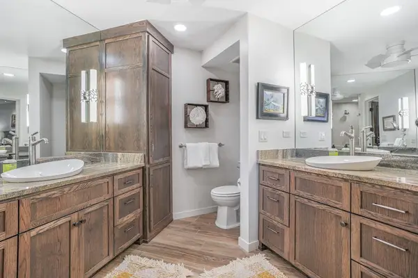 Spacious en-suite bathroom with a double vanity