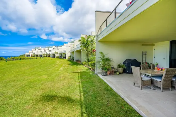 Expansive oceanfront lawn just steps from the shoreline