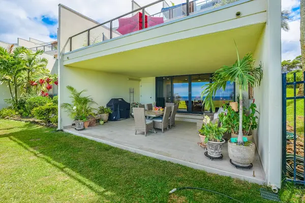 Enjoy outdoor dining in a private covered lanai