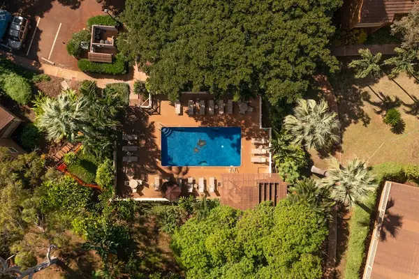 Create unforgettable vacation memories with refreshing swims beneath beautiful tropical blue skies