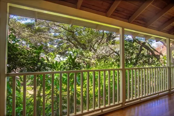 Start mornings with coffee on the inviting balcony overlooking beautiful tropical surroundings