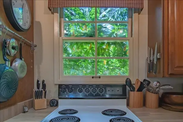 Stylish kitchen combining practical workspace with modern appliances for everyday convenience