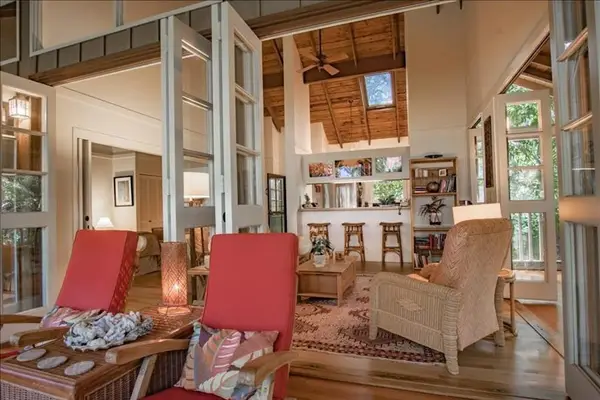 Beautiful receiving area welcomes guests with comfortable seating and inviting tropical atmosphere