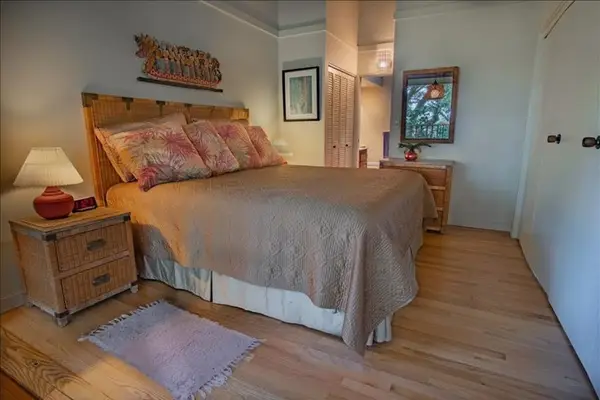 Comfortable king bed with fresh linens for restful nights and peaceful mornings