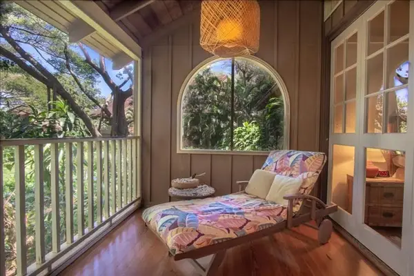 Furnished balcony offers the perfect setting for coffee breaks and shared meals