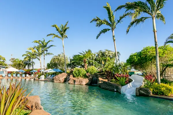 Resort Pool Surrounded By Paradise