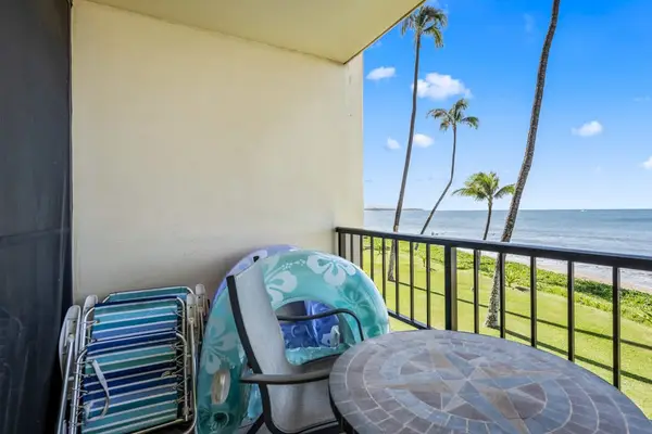 Covered Lanai Equipped With Beach Gear For Fun In The Sun