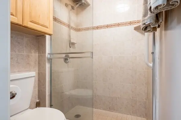Pristine Guest Bath Equipped For Utmost Comfort