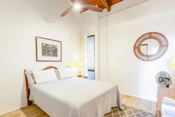 Cozy guest bedroom with natural light