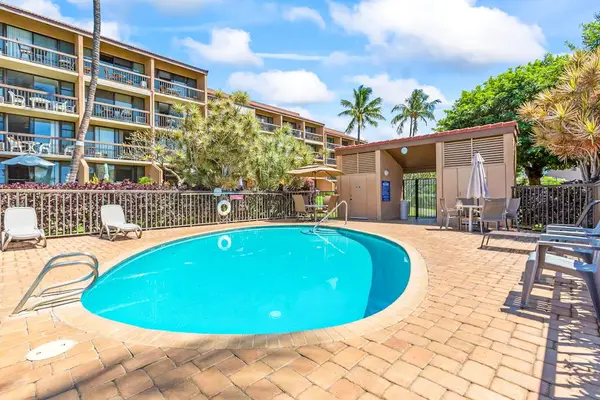 Refreshing pool surrounded by lounge chairs