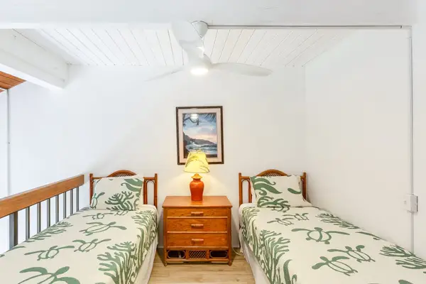 Loft bedroom with two twin beds