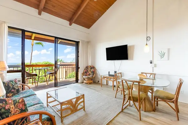 Bright living area with lanai access
