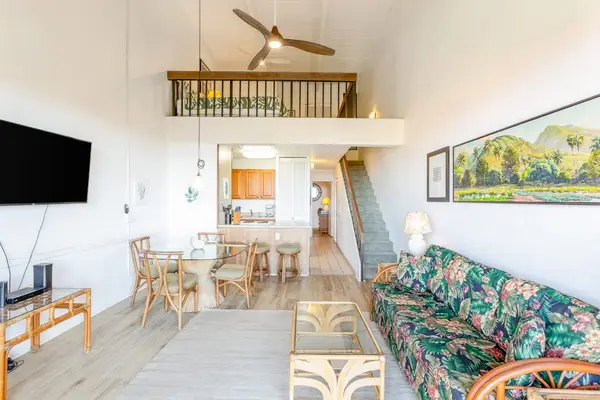 Spacious living room with loft above