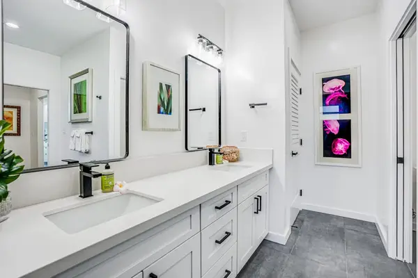 Spacious bathroom with glass walk-in shower