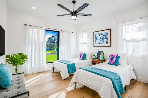 Cozy guest bedroom with natural light