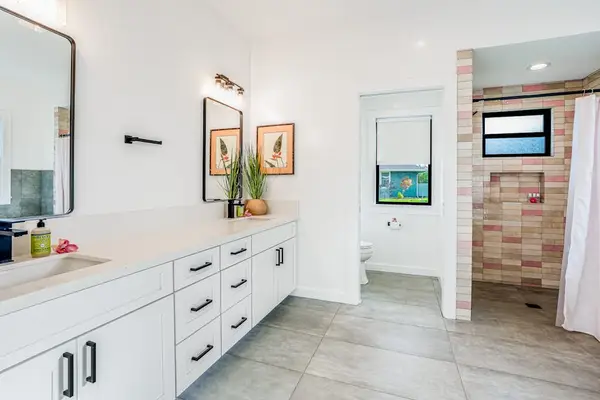 Large bathroom with dual sinks