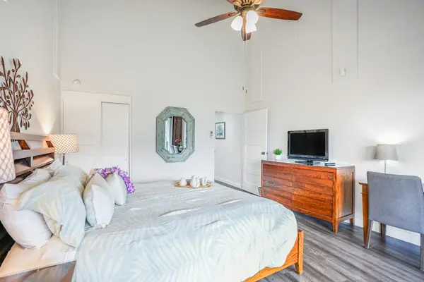 Rest comfortably in this welcoming bedroom with bright open surroundings
