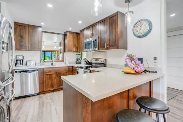 Prepare favorite meals easily in this bright spacious modern kitchen
