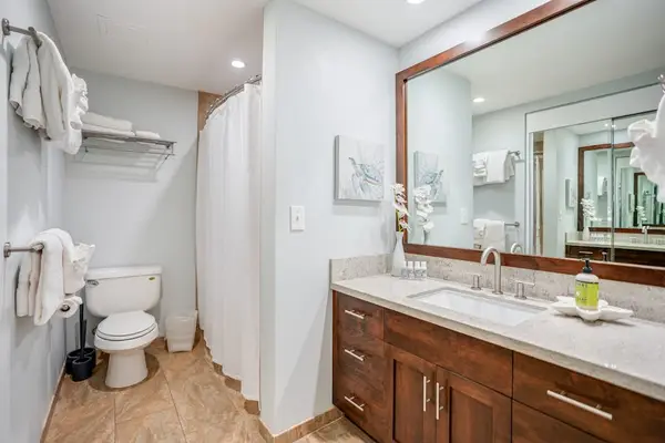 Freshen up easily in this bright and convenient bathroom space