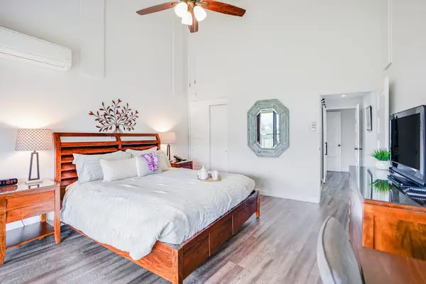Spacious bedroom offers a calm setting for peaceful vacation nights