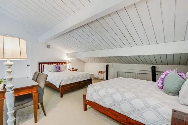 Relax upstairs in this cozy loft designed for restful evenings