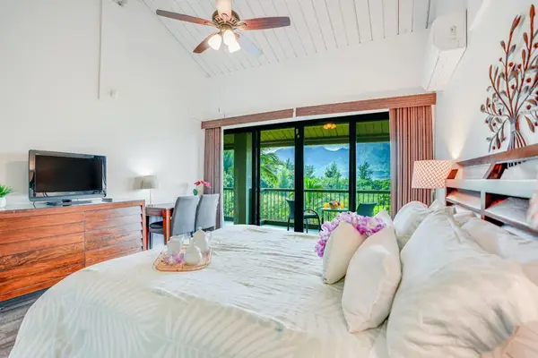 Wake up refreshed in this comfortable bedroom filled with sunlight