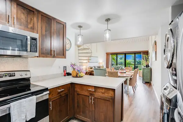 Cook delicious vacation meals in this warm and functional kitchen